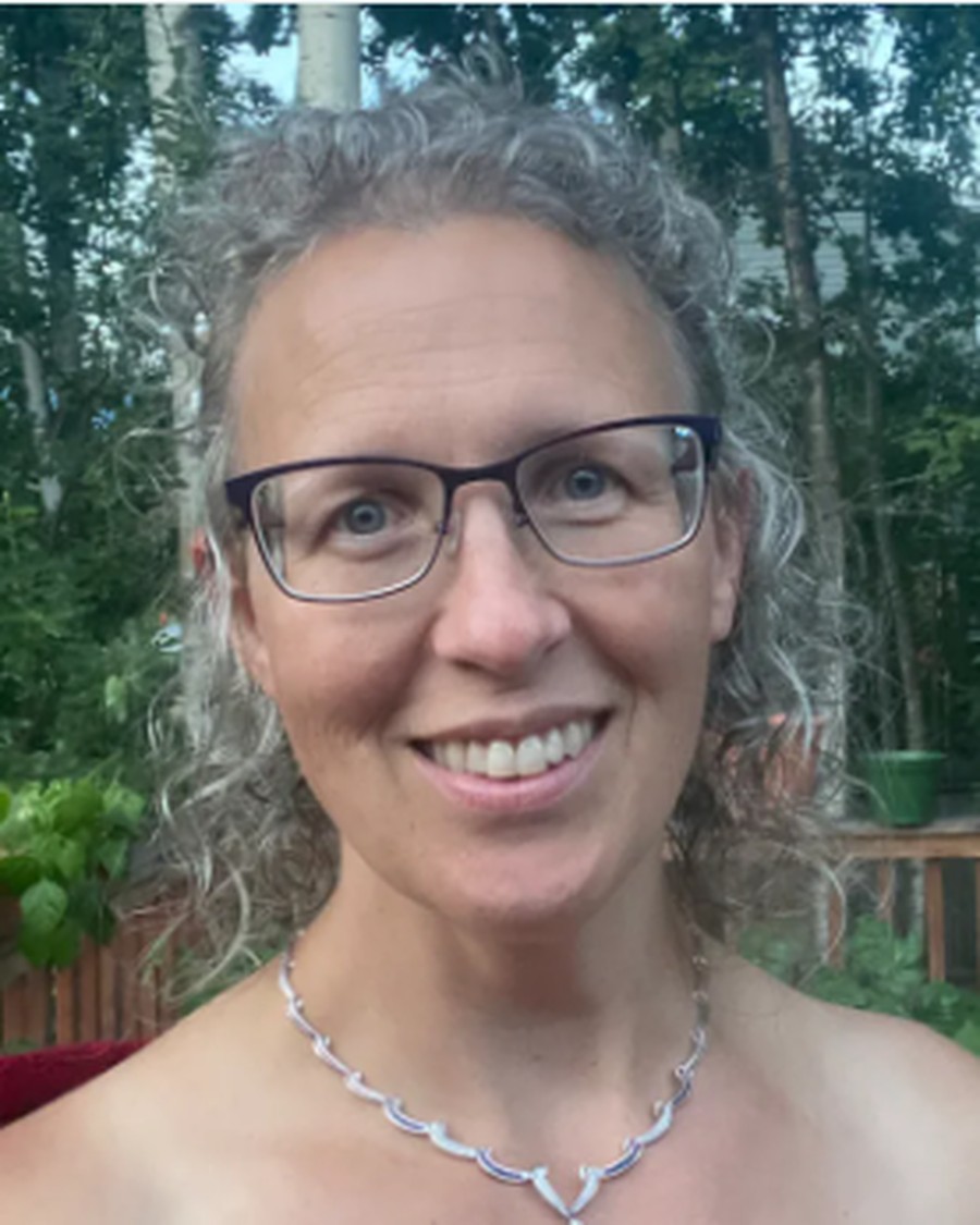 Andrea Tavenner, watercolor artist, photographed outdoors in Alaska